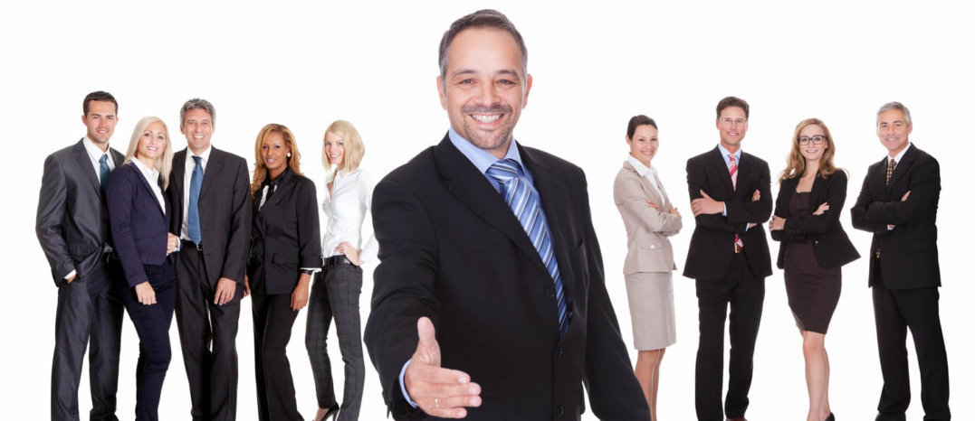 Portrait of happy businessman and his team